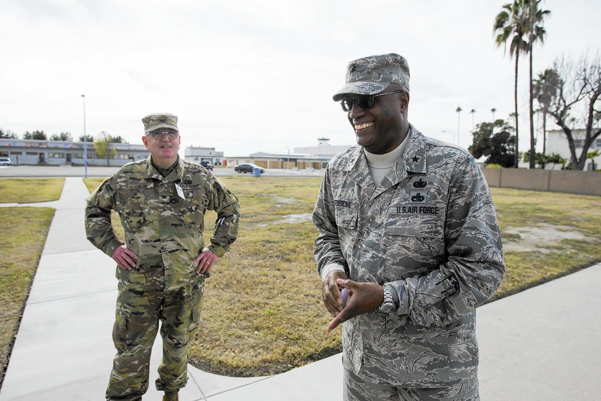 Col. Richard Lalor, left, and Brig. Gen. Nathaniel S. Reddicks discuss the future of the Los Alamitos Joint Forces Training Base.