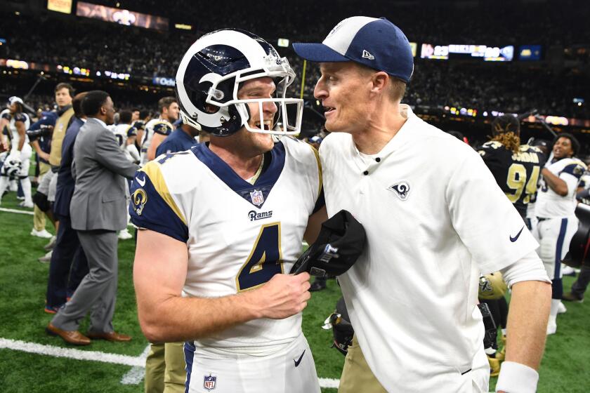 NEW ORLEANS. LOUISIANA JANUARY 20, 2018-Rams kicker Greg Zuerlein celebrates his game-winning filed goal with special teams coach John Fassel in the NFC Championship at the Superdome in New Orleans Sunday. (Wally Skalij/Los Angeles Times)