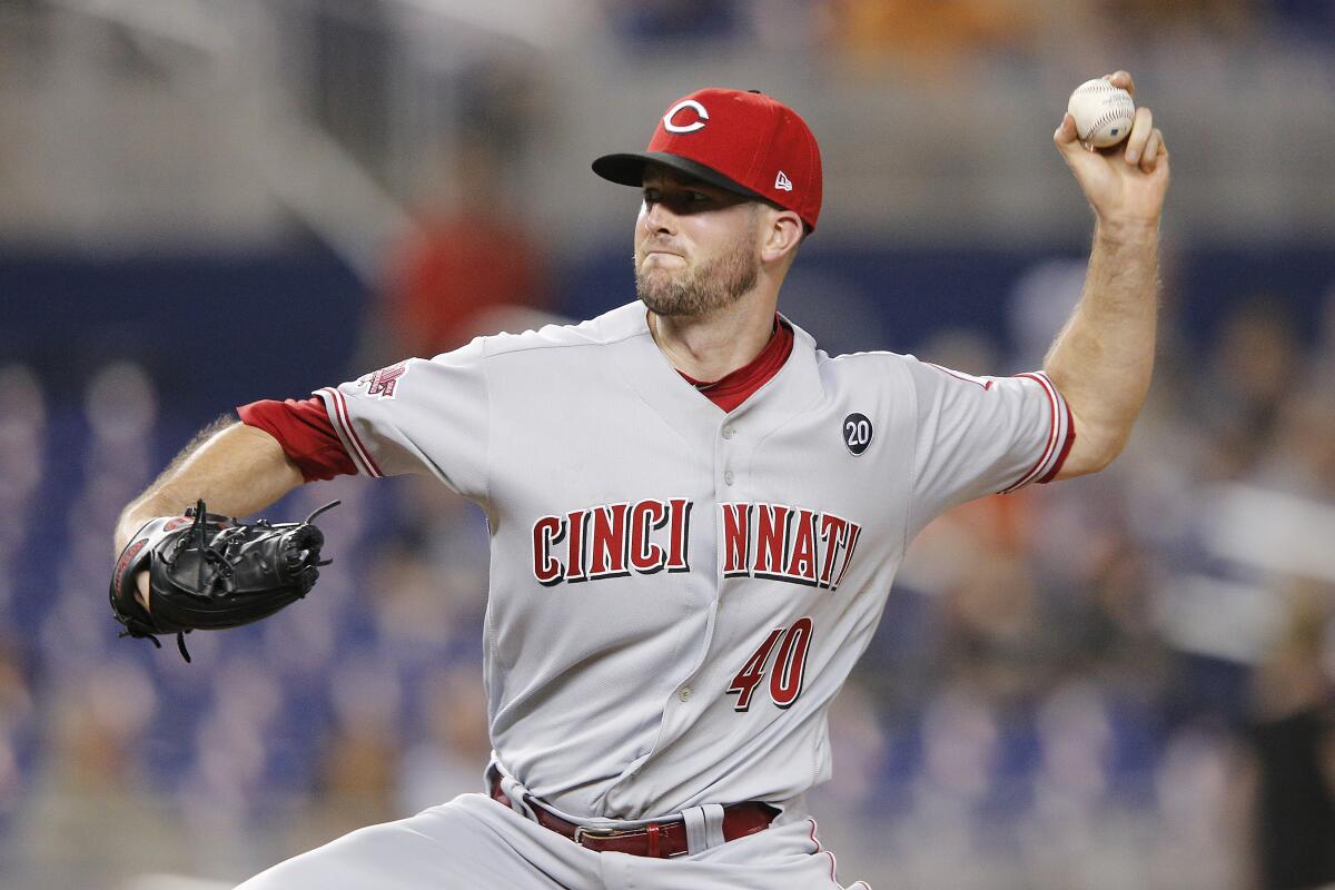 Alex Wood delivers a pitch for the Reds against the Marlins on Aug. 29, 2019 in Miami.