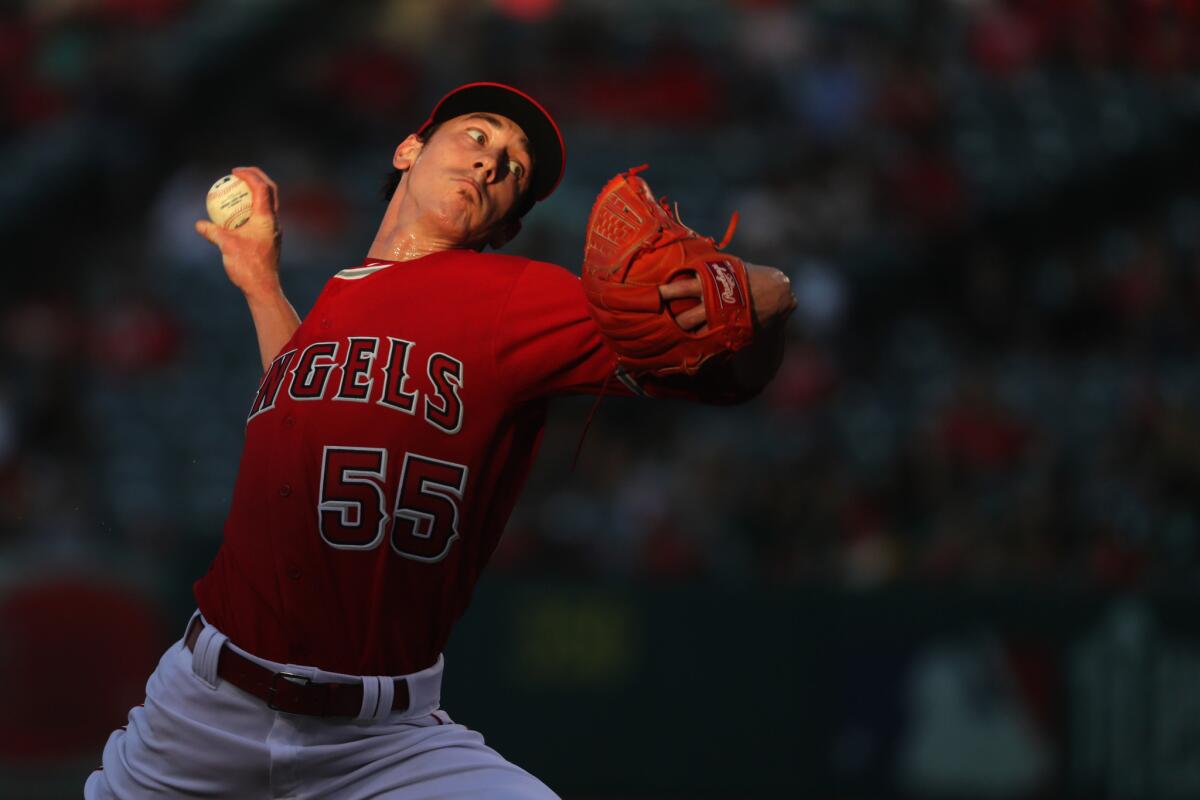 Angels starting pitcher Tim Lincecum (55) delivers during the first inning against the Oakland Athletics on June 23.