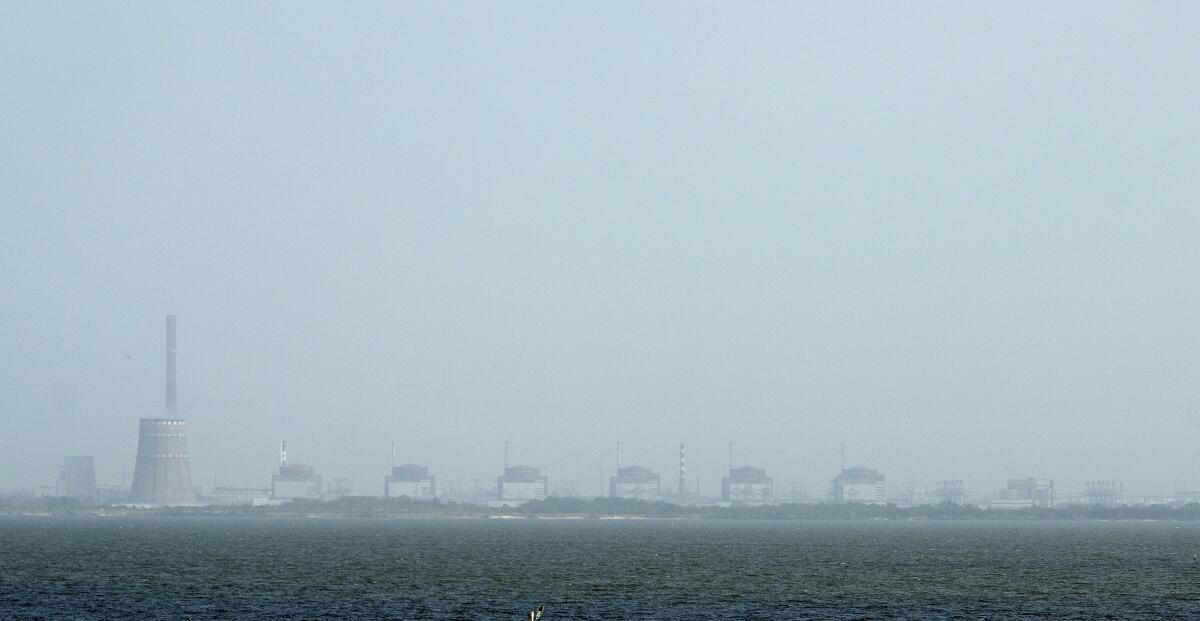 FILE - A view of the Zaporizhzhya nuclear plant and the Dnipro river on the other side of Nikopol, Ukraine on Aug, 22, 2022. (AP Photo/Evgeniy Maloletka, File)