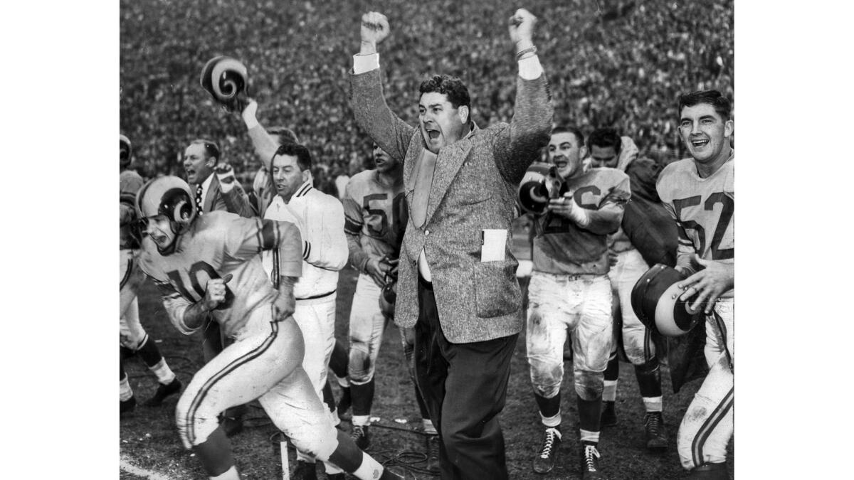Dec. 23, 1951: Coach Joe Stydahar and members of the Los Angeles Rams celebrate winning the NFL Championship 24-17 over the Cleveland Browns in game at the Coliseum.
