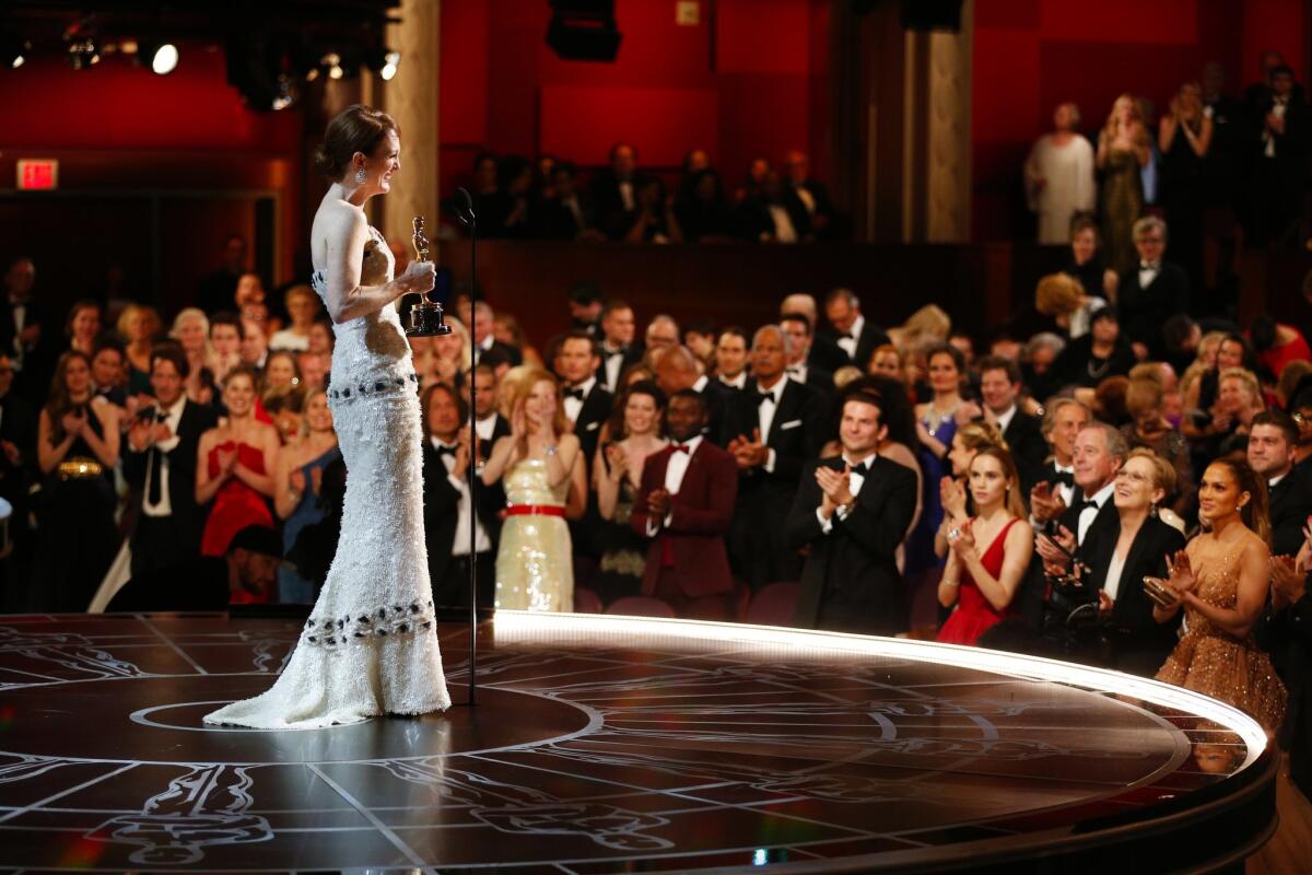 Julianne Moore wins the lead actress Oscar for "Still Alice" at the 87th Academy Awards.