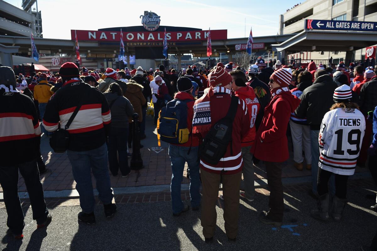 NHL fans stream into Nationals Park for the 2015 NHL Winter Classic between the Chicago Blackhawks and Washington Capitals.