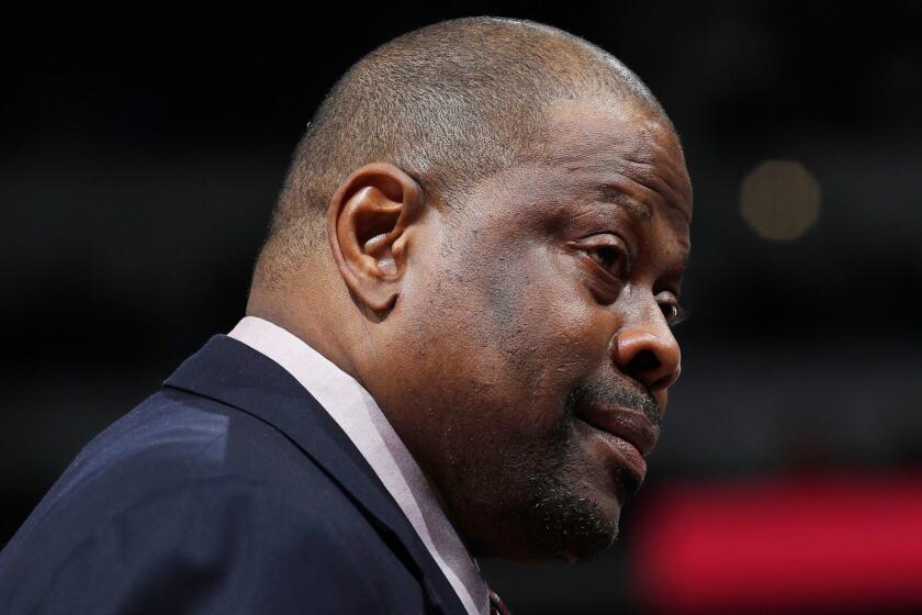 Charlotte Hornets assistant coach Patrick Ewing in the second half of an NBA basketball game Saturday, March 4, 2017, in Denver. Charlotte won 112-102. (AP Photo/David Zalubowski)