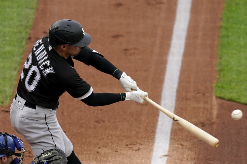 Chicago White Sox's Danny Mendick hits a two-run home run during the first inning of a baseball game against the Kansas City Royals Saturday, May 8, 2021, in Kansas City, Mo. (AP Photo/Charlie Riedel)