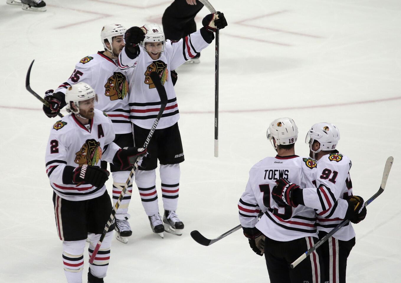 Jonathan Toews and teammates