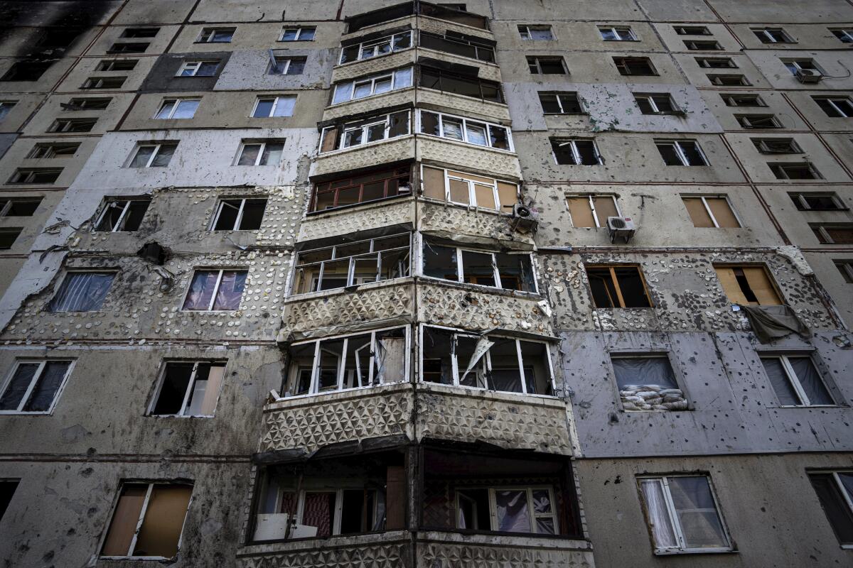 An apartment building damaged by a Russian attack in Saltivka district in Kharkiv.