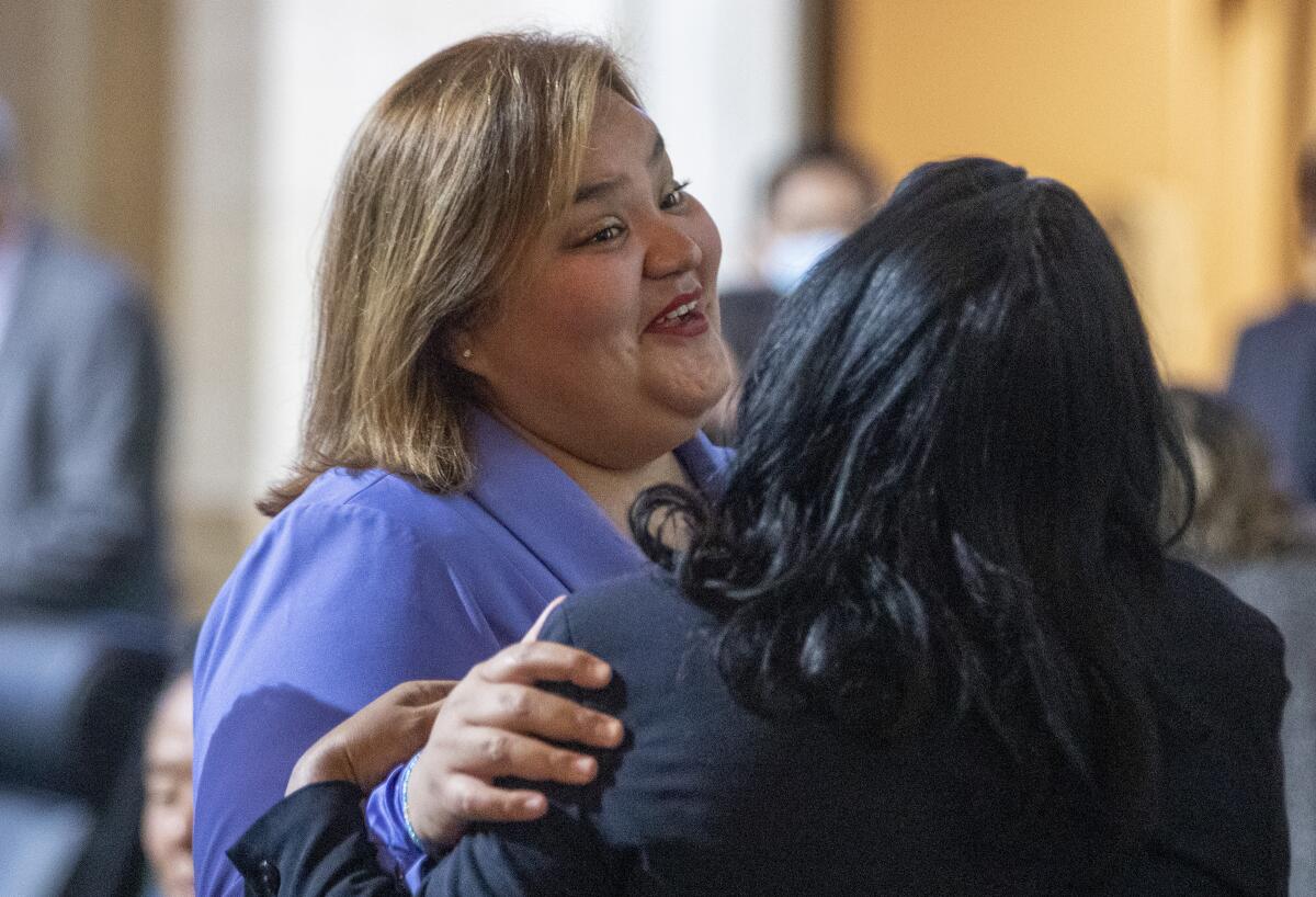 Los Angeles Councilmember Eunisses Hernandez greets a colleague 