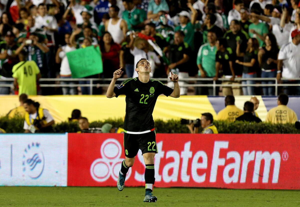 Mexican defender Paul Aguilar celebrates after scoring the game-winning goal against the U.S. in the second overtime period of the CONCACAF Cup game at the Rose Bowl.