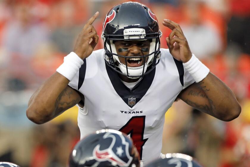 FILE - In this Aug. 9, 2018, file photo, Houston Texans quarterback Deshaun Watson (4) signals a play at the line of scrimmage during the first half of an NFL preseason football game against the Kansas City Chiefs, in Kansas City, Mo. Watson was so thrilling while healthy. Yet the second-year quarterback will be tested if an offensive line anchored by center Nick Martin and featuring three new starters canât protect Watson any better than a year ago when the Texans gave up the second-most sacks in the NFL. (AP Photo/Colin E. Braley, File)
