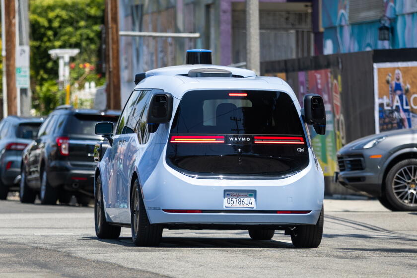 Image 2: Venice Beach, CA - May 27, 2026: Waymo's new autonomous vehicle, called the Ojai, drives in Venice Beach on Wednesday, May 27, 2026. The all-electric vehicle, equipped with the company's sixth-generation autonomous driving system, is expected to begin limited rides with select customers in Los Angeles, San Francisco and Phoenix in the coming weeks. (Allen J. Schaben / Los Angeles Times) The news is under embargo until May 28th at 8am.