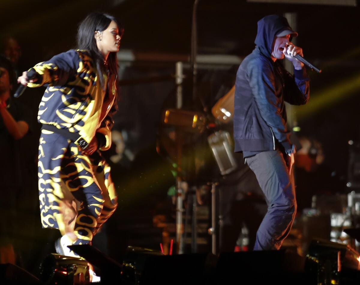 Rihanna and Eminem perform Thursday night at the Rose Bowl.