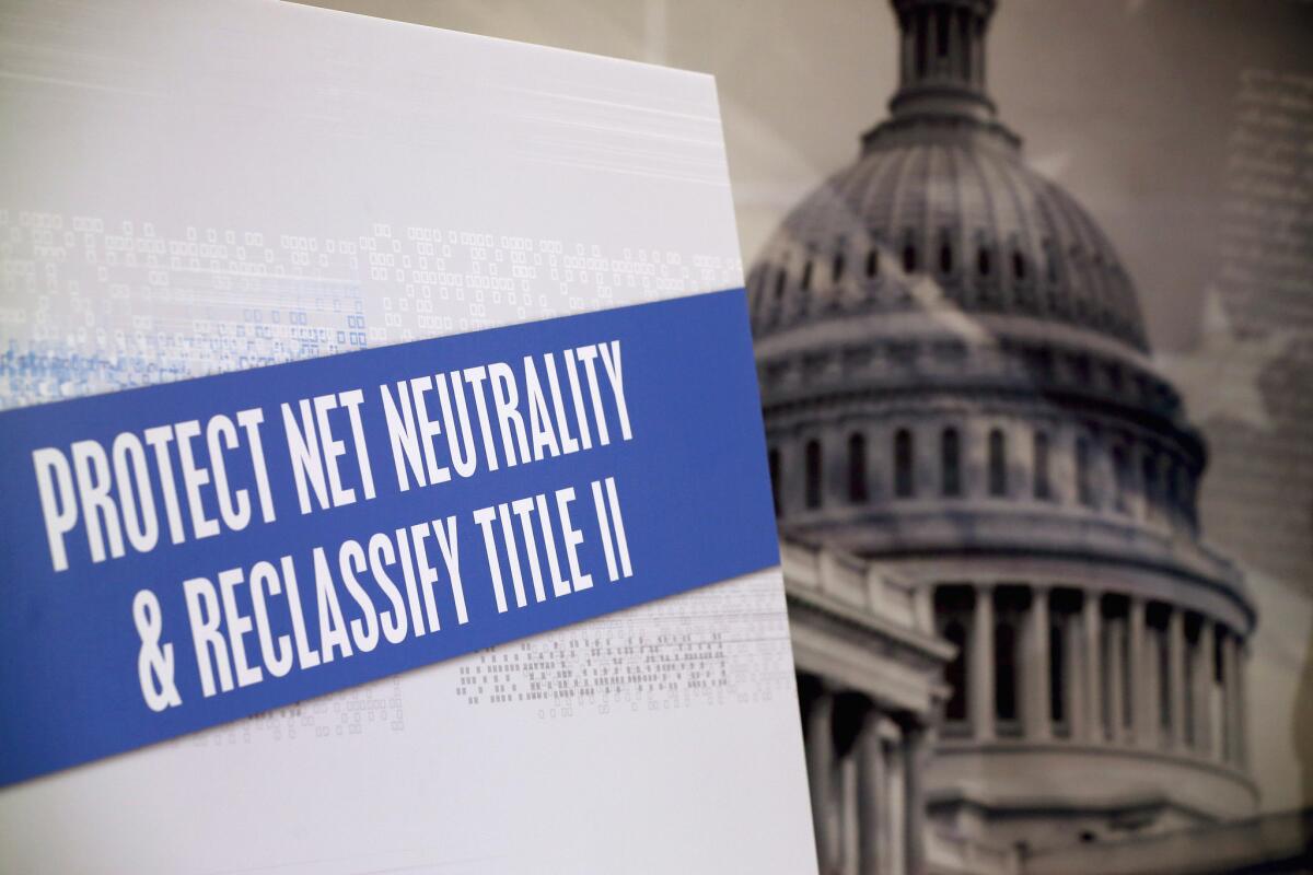 A sign that reads "Protect Net Neutrality & Reclassify Title II is on display during a Feb. 4 news conference on Capitol Hill in Washington, DC.