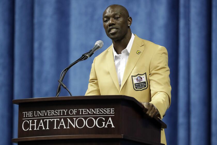 Former NFL wide receiver Terrell Owens delivers his Pro Football Hall of Fame speech at the University of Tennessee at Chattanooga on Aug. 4, 2018. Owens still hasn't changed his mind about how he views the Pro Football Hall of Fame.