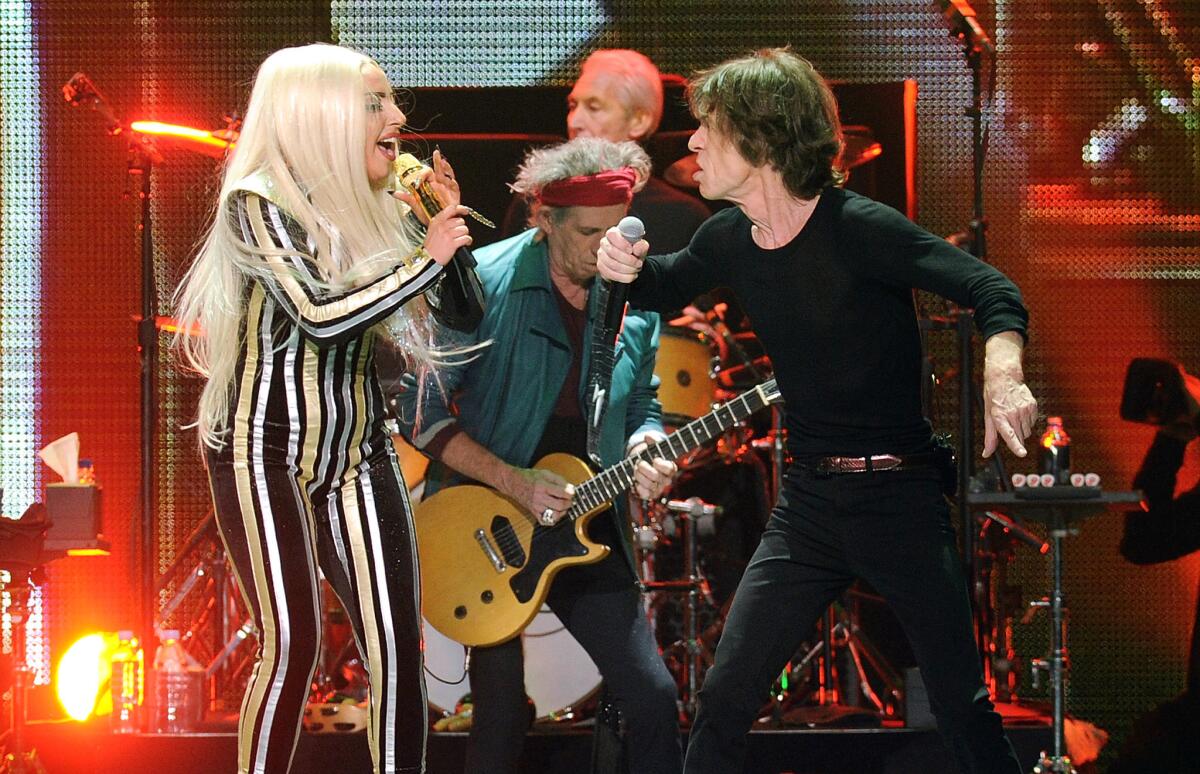 Lady Gaga joins Mick Jagger, guitarist Keith Richards and drummer Charlie Watts at the Rolling Stones' 50th anniversary concert in New Jersey.