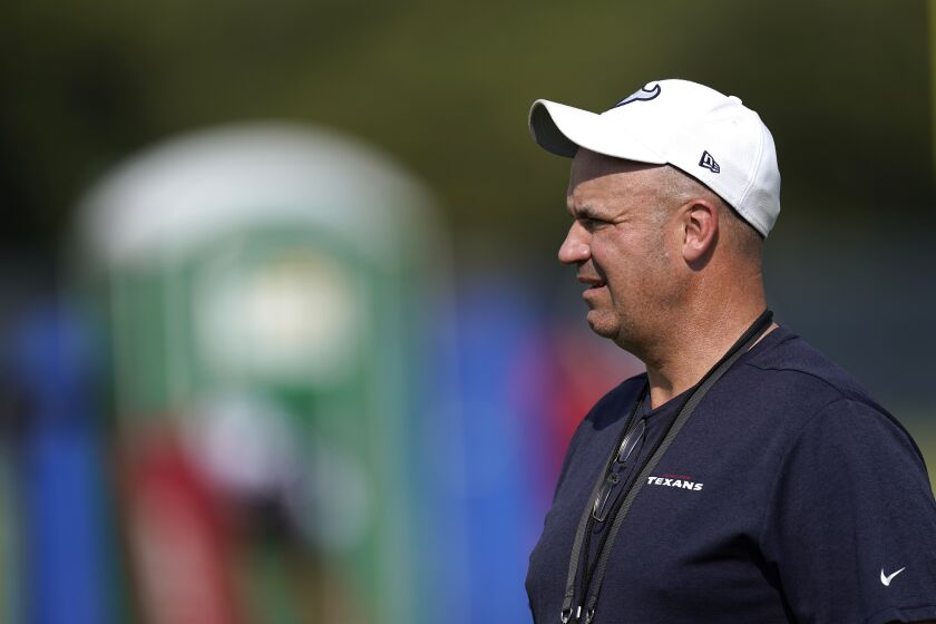 Houston Texans coach Bill O'Brien watches during an NFL training camp football practice Friday, Aug. 21, 2020, in Houston. (AP Photo/David J. Phillip)