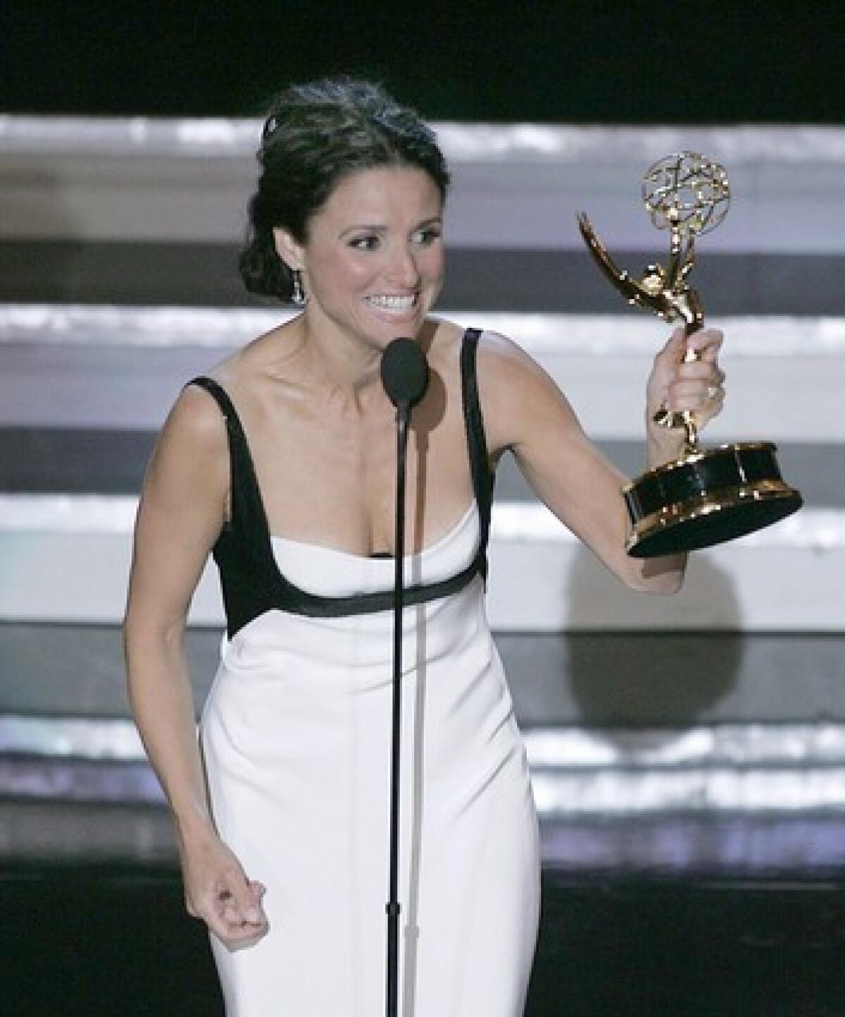 Julia Louis-Dreyfus wins her second Emmy, breaking the so-called "Seinfeld curse," in 2006.