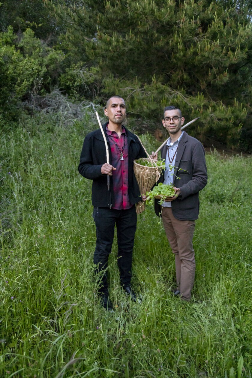 Vincent Medina and Louis Trevino gather ingredients in the Berkeley Hills for a dinner at Cafe Ohlone.