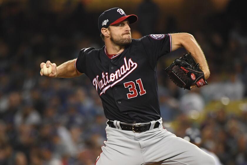 LOS ANGELES, CALIFORNIA - OCTOBER 04: Max Scherzer #31 of the Washington Nationals pitches in relief in the eighth inning in game two of the National League Division Series against the Los Angeles Dodgers at Dodger Stadium on October 04, 2019 in Los Angeles, California. (Photo by Harry How/Getty Images)