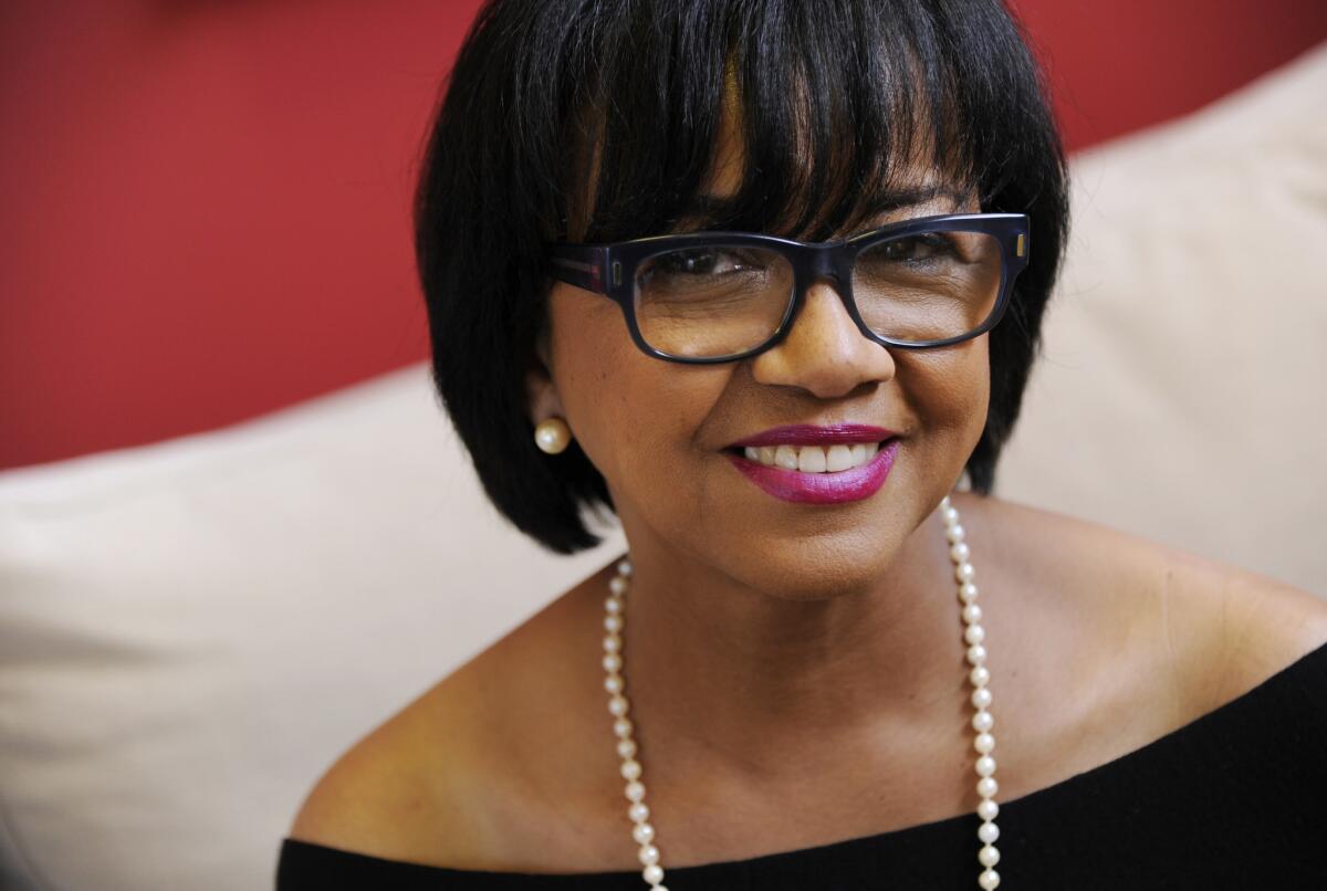 Motion picture academy reelects Cheryl Boone Isaacs as president.