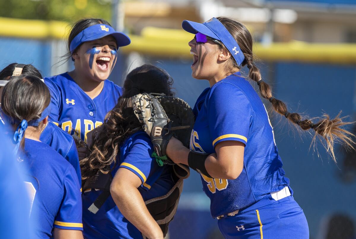 The Fountain Valley softball team celebrates after beating San Marino 5-2 in a CIF Southern Section Division 5 quarterfinal.