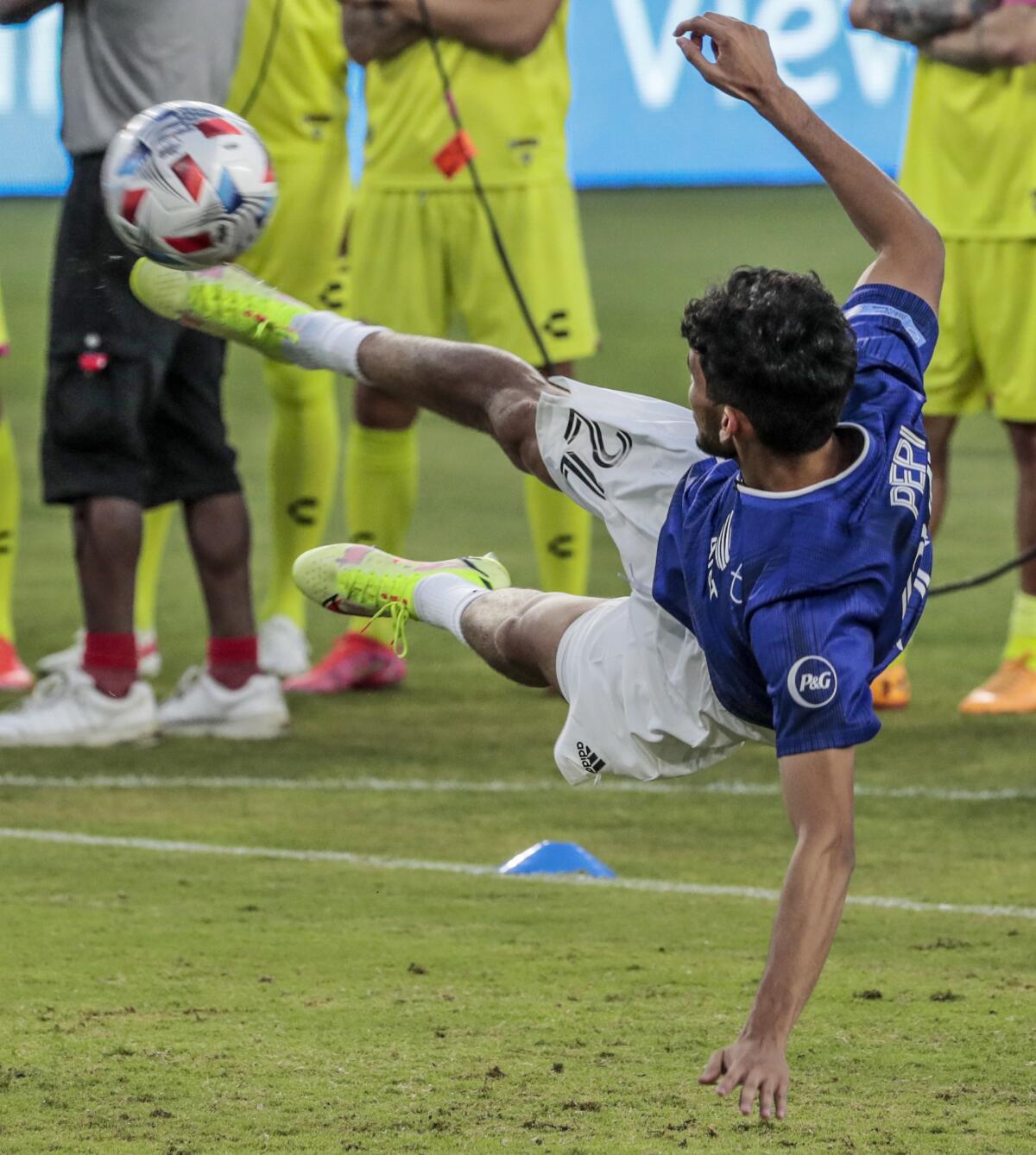 FC Dallas player Ricardo Pepi makes a scissors kick during the MLS All-Star Skills Challenge.