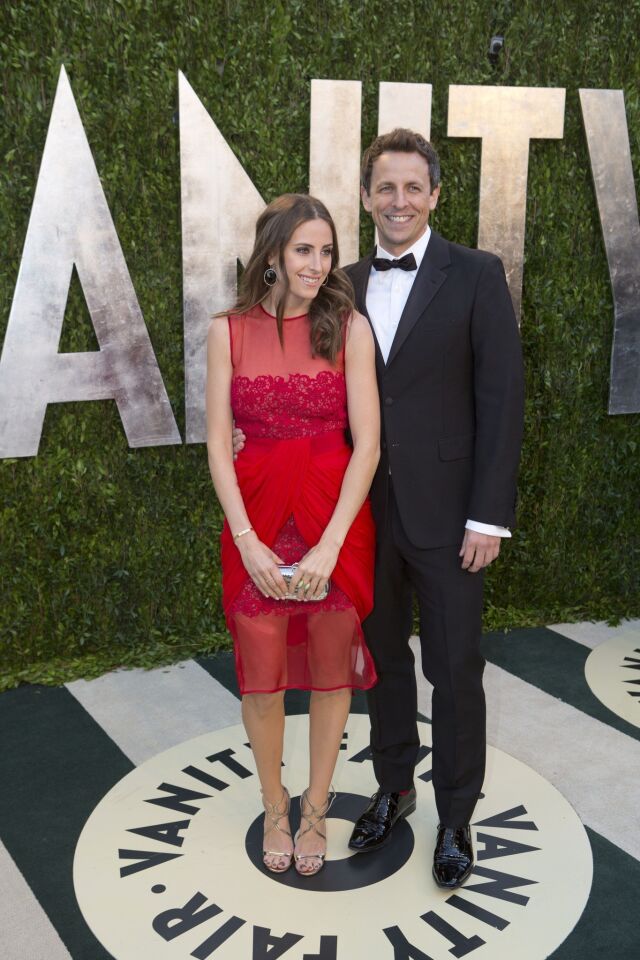 "Saturday Night Live" writer and star Seth Meyers, right, and girlfriend Alexi Ashe.