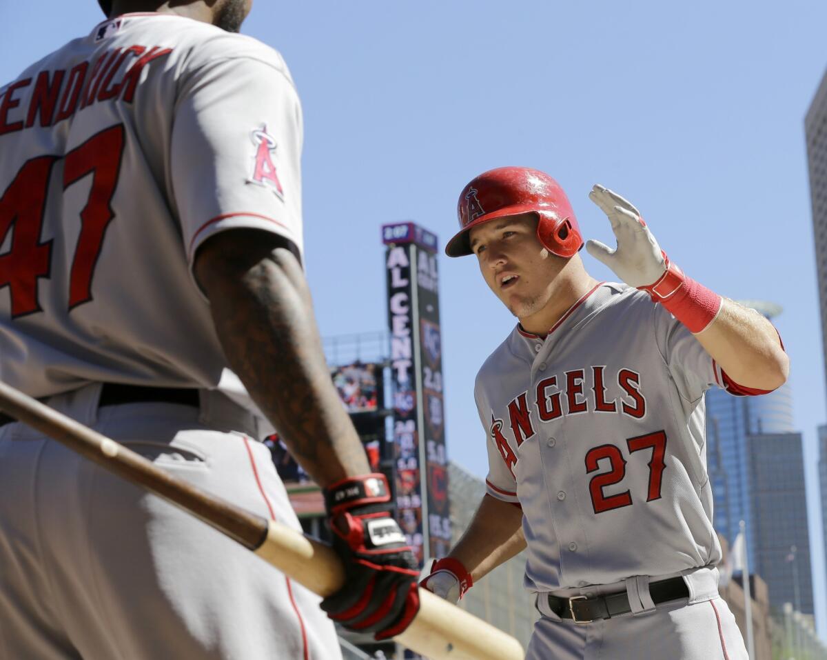 Mike Trout celebrates after hitting a two-run home run against Minnesota on Sept. 7. If things keep going the Angels' way they could open the playoffs Oct. 2.