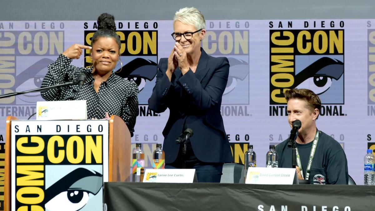 Moderator Yvette Nicole Brown, left, with "Halloween" star Jamie Lee Curtis and director David Gordon Green at Universal Pictures' "Glass" and "Halloween" panels during Comic-Con International 2018.