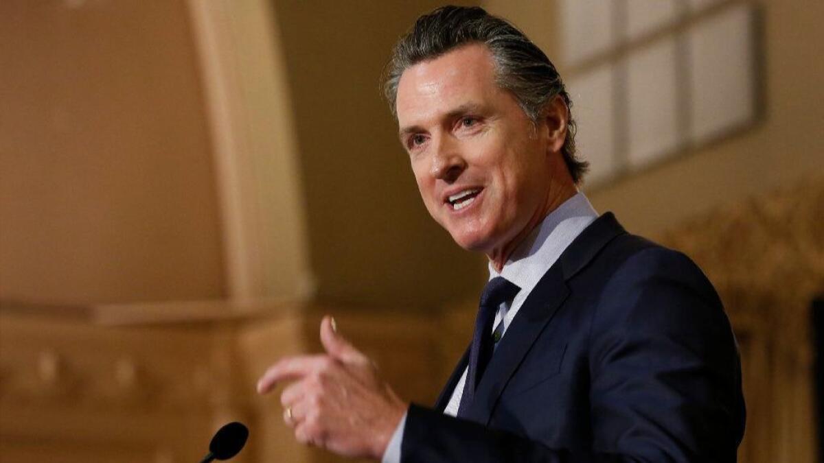 Gov. Gavin Newsom alleges Huntington Beach has failed to set aside sufficient land for new residential development, defying a California law.