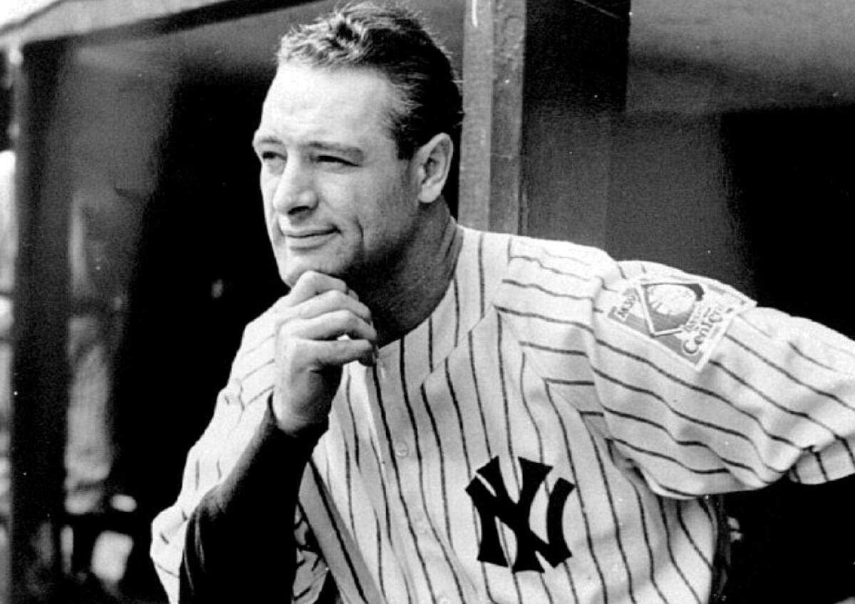 Lou Gehrig stands in the dugout at Yankee Stadium in 1939.