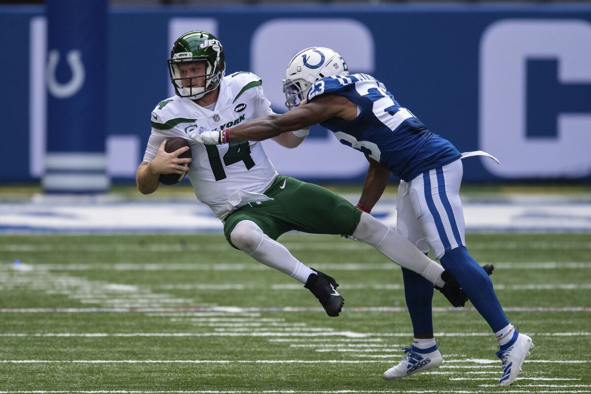 Colts cornerback Kenny Moore sacks New York Jets quarterback Sam Darnold.