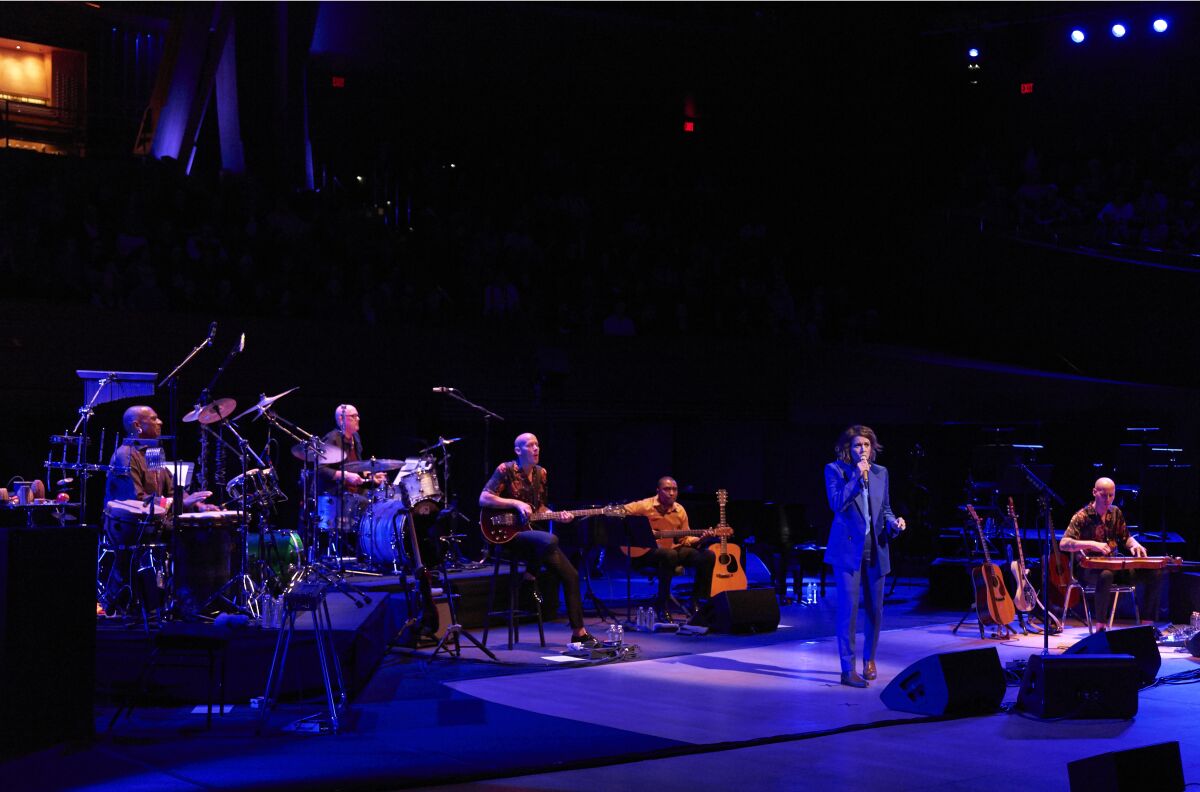 Brandi Carlile and band performed Joni Mitchell's "Blue" at Walt Disney Concert Hall, as Mitchell looked on from the audience.