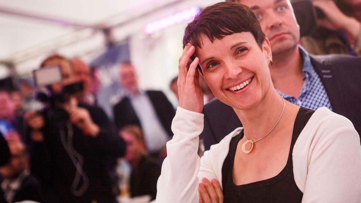 Frauke Petry, chairwoman of Alternative for Germany, a nationalist, anti-immigration party, reacts as election results come in on Sunday in Berlin.
