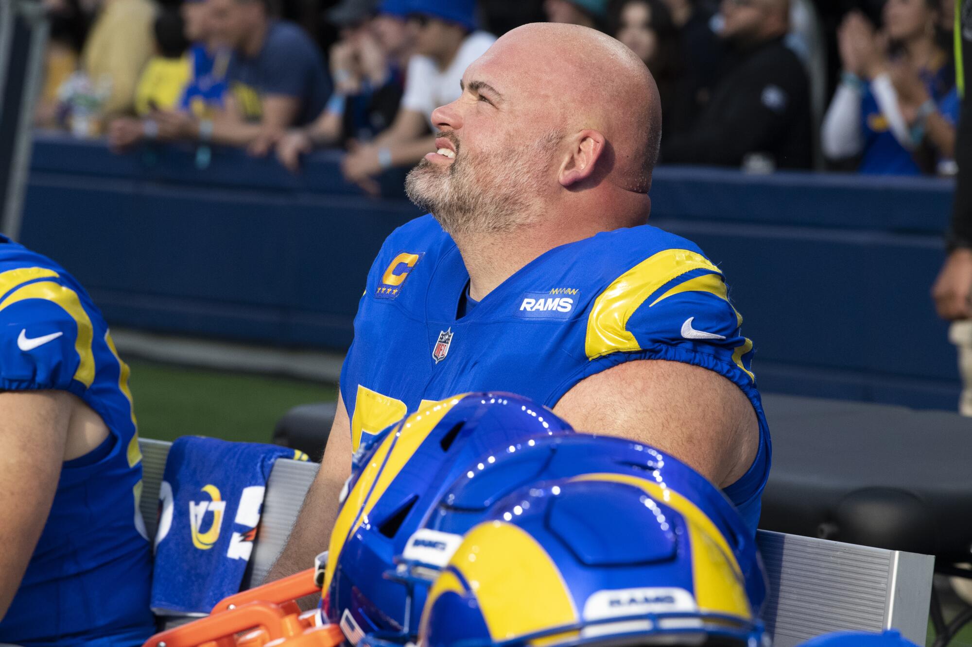 Andrew Whitworth looks up at the scoreboard while catching his breath between series.