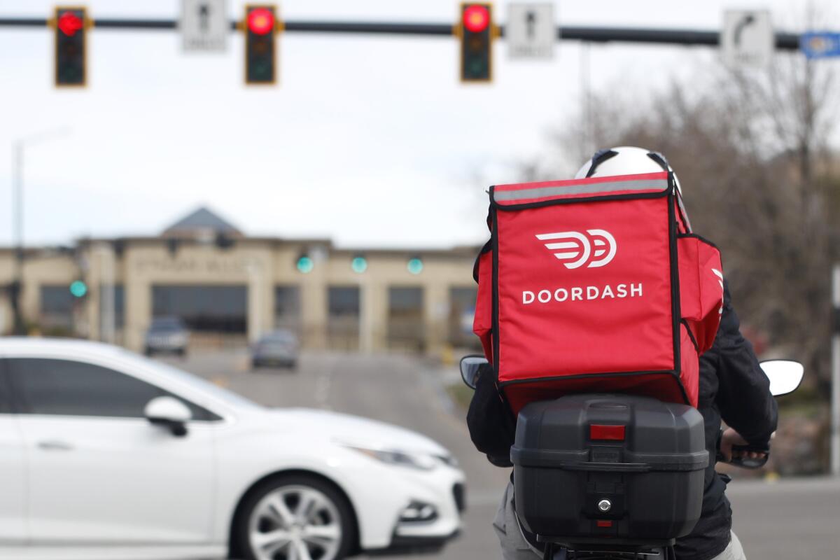 DoorDash was cheated out of more than $2.5 million in a scheme involving fake deliveries, prosecutors say.