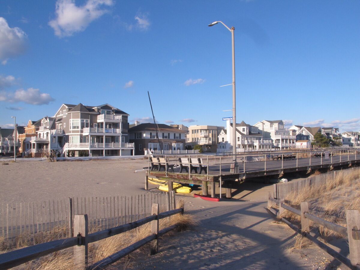 FILE - This Jan. 16, 2020 file photo shows the end of the Ventnor, N.J. boardwalk as seen from Margate, N.J., where a group of residents want the city to build its own boardwalk. Voters rejected the proposal on Nov. 3. (AP Photo/Wayne Parry, File)