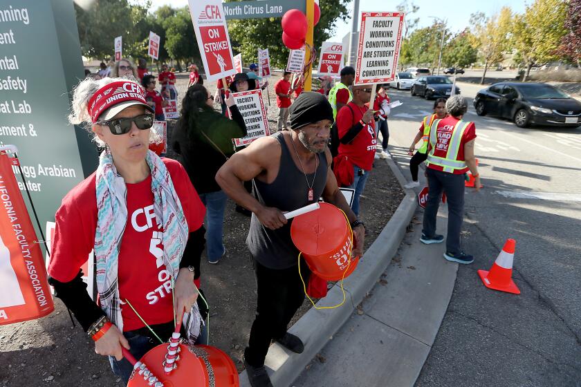 Pomona, CA - Faculty at Cal-Poly Pomona strike on campus on Monday, Dec. 4, 2023, Faculty at four California State University campuses are going on strike this week for higher pay, and other demands, including lactation spaces on campuses. (Luis Sinco / Los Angeles Times)