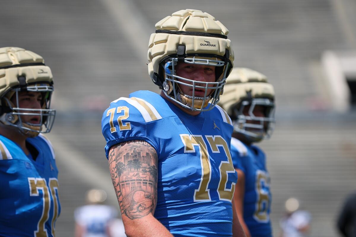 UCLA offensive lineman Garrett DiGiorgio warms up ahead of the team's spring showcase.