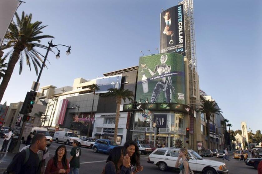 CIM has secured a $30-million federal loan to help it attract Cirque du Soleil to the Kodak Theatre at its Hollywood & Highland mall, above. In L.A., officials have offered CIM at least $58 million in loans and grants.
