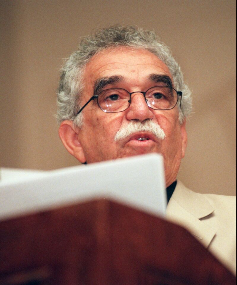 Gabriel Garcia Marquez reads in Pasadena at the 52nd general assembly of the Inter-American Press Assn. in October 1996. Garcia Marquez was a journalist before he began writing novels.