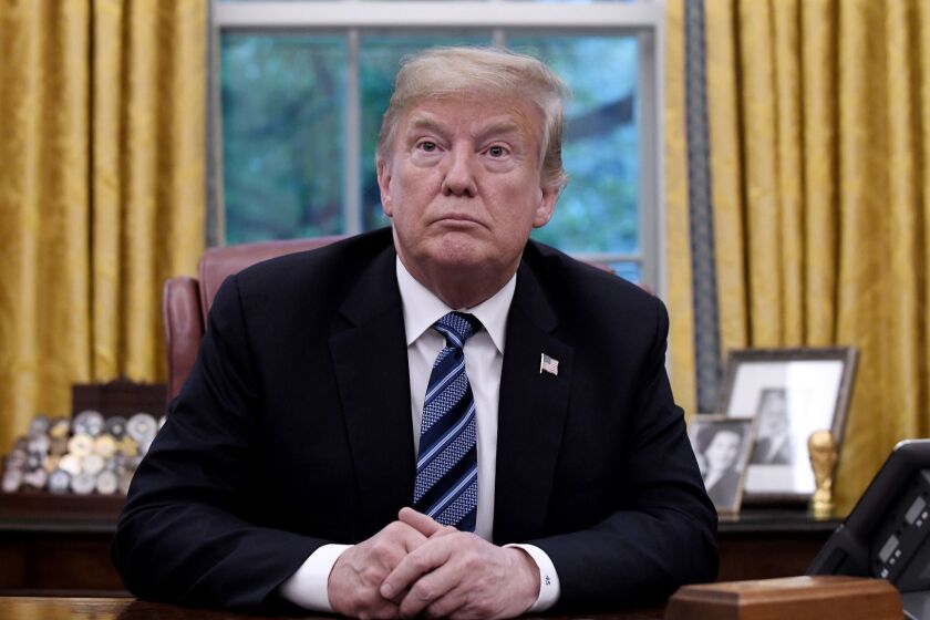 President Donald Trump in the Oval Office of the White House on September 11, 2018, in Washington, D.C. Vulnerable House Republicans are charting careful paths through midterm elections in the unpopular president's wake. (Olivier Douliery/Abaca Press/TNS) ** OUTS - ELSENT, FPG, TCN - OUTS **