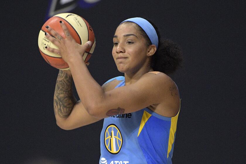 Chicago Sky forward Gabby Williams sets up a play during the first half of a WNBA basketball first round playoff game against the Connecticut Sun, Tuesday, Sept. 15, 2020, in Bradenton, Fla. (AP Photo/Phelan M. Ebenhack)