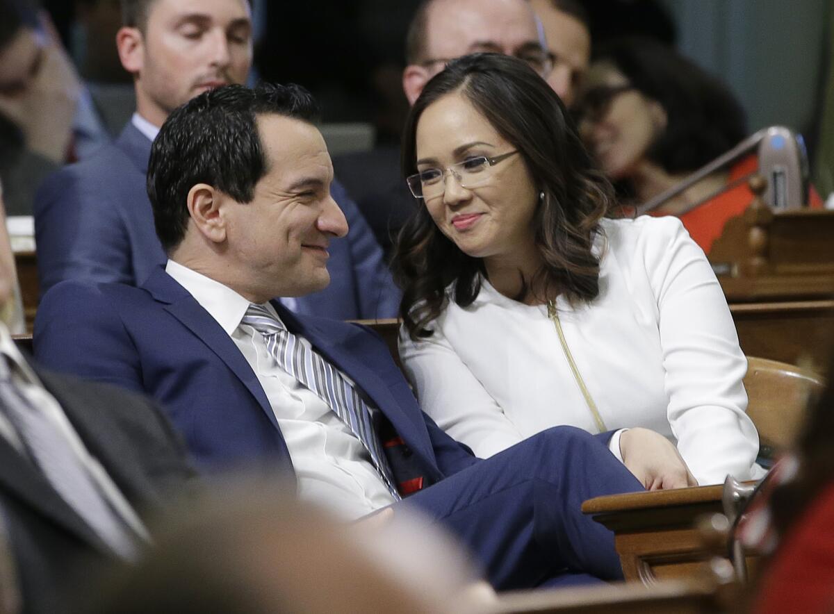 Anthony Rendon smiles at his wife, Annie Lam, in the Assembly.