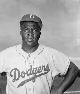 Jackie Robinson in a Dodgers jersey.