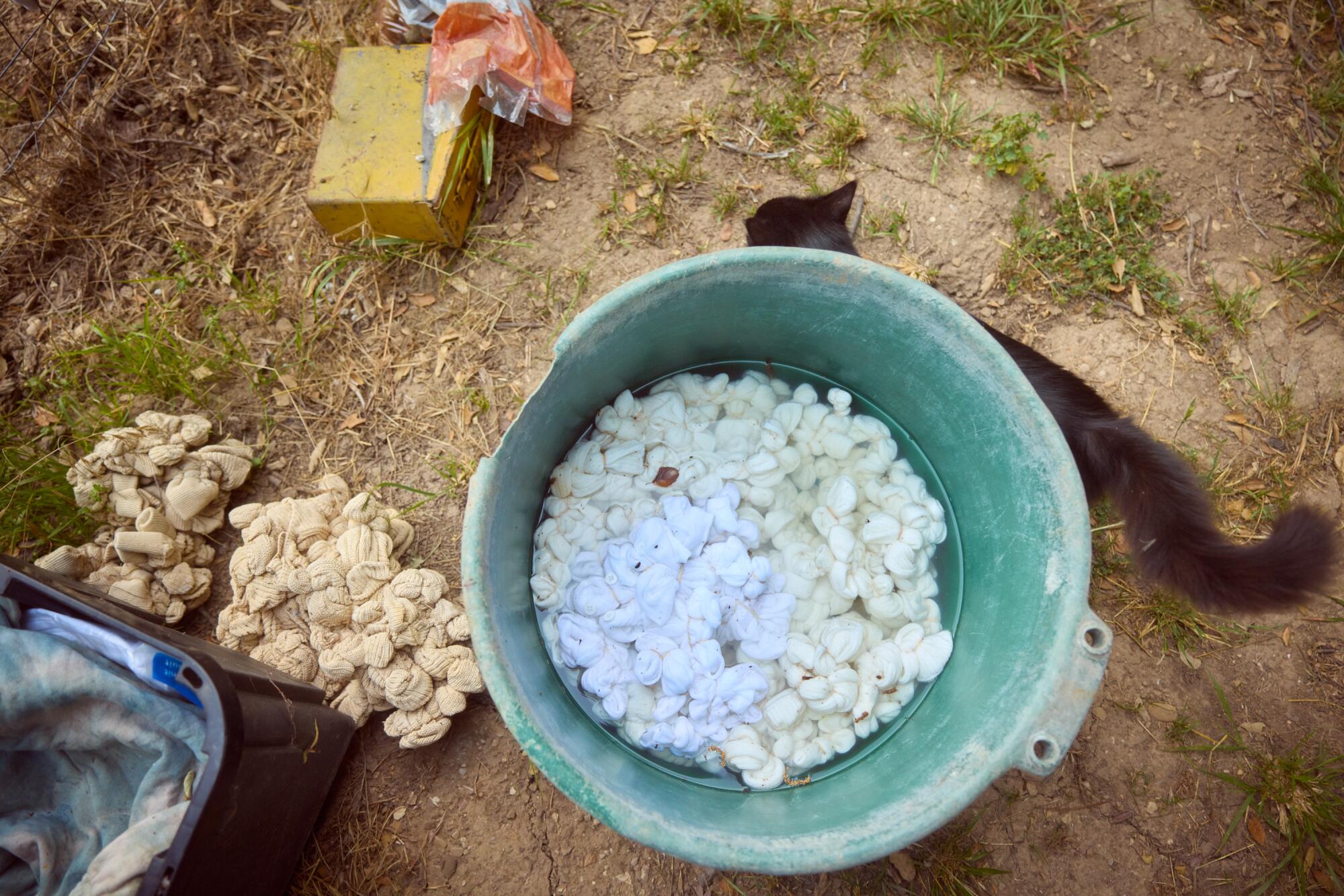 Textiles in the tie-dye process.  