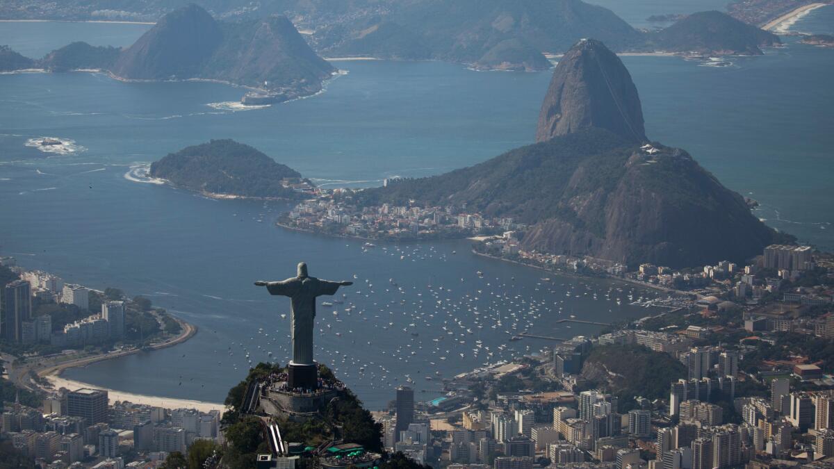 Christ the Redeemer stands over Guanabara Bay in Rio de Janeiro.