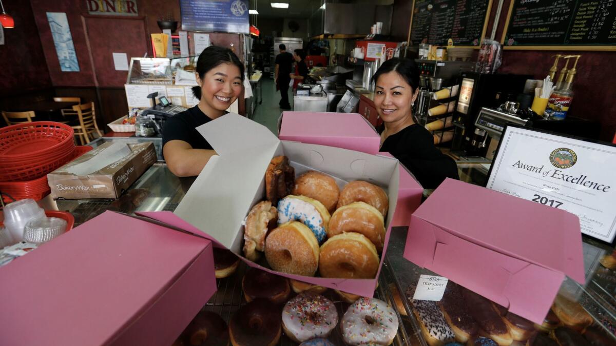 Amanda Tang, left, and Susan Lim at Rose Donuts & Cafe in San Clemente.