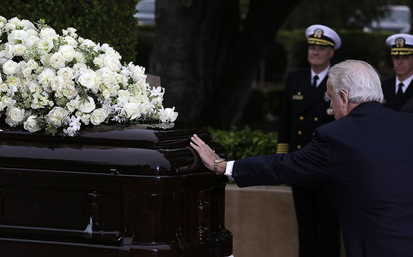 Former Canadian Prime Minister Brian Mulroney pauses at Nancy Reagan's casket at the Ronald Reagan Presidential Library in Simi Valley.